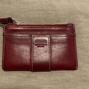 Dark red leather Coach change purse